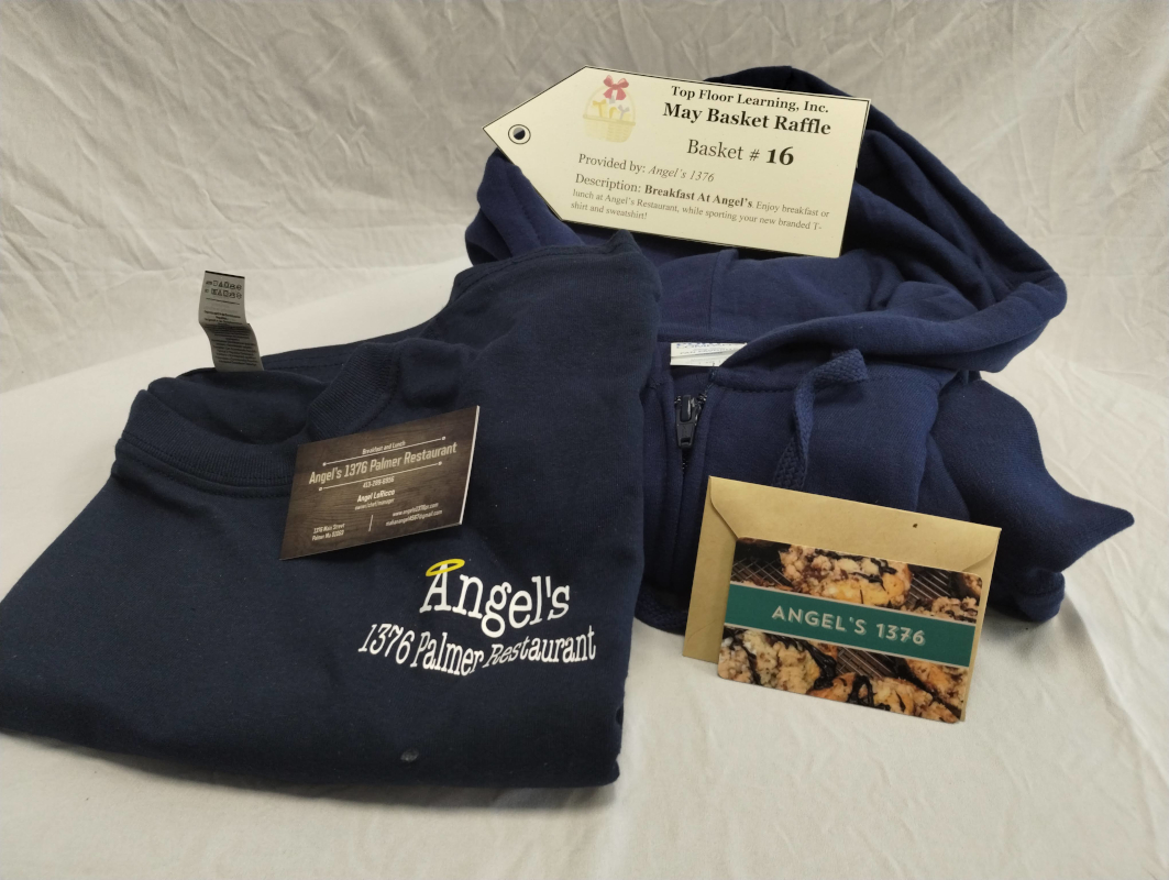 photograph of branded tee shirt and sweatshirt with gift card and business cards on top.