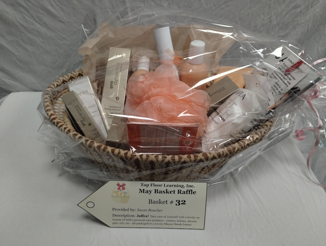 a basket full of skin care items as well as a loofa.