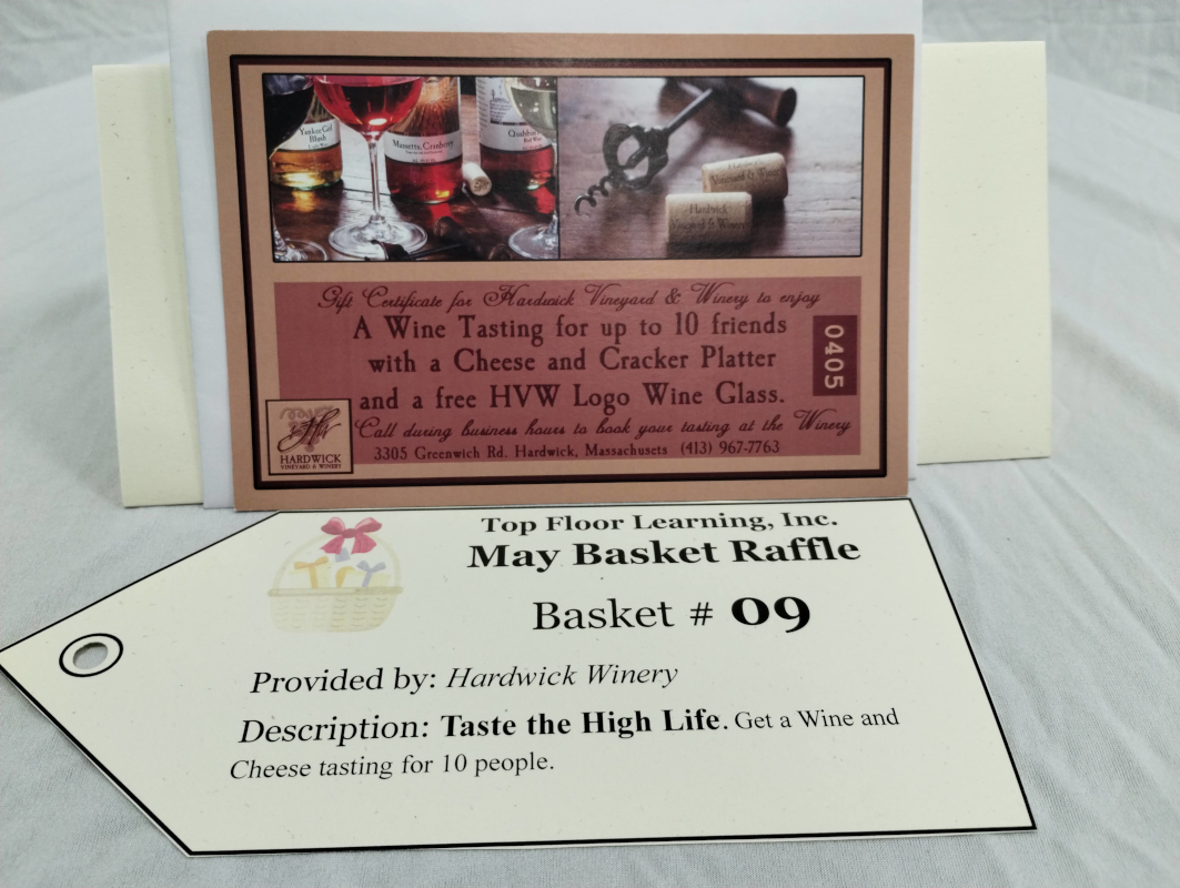 photograph of a gift certificate for a wine tasting and cheese platter